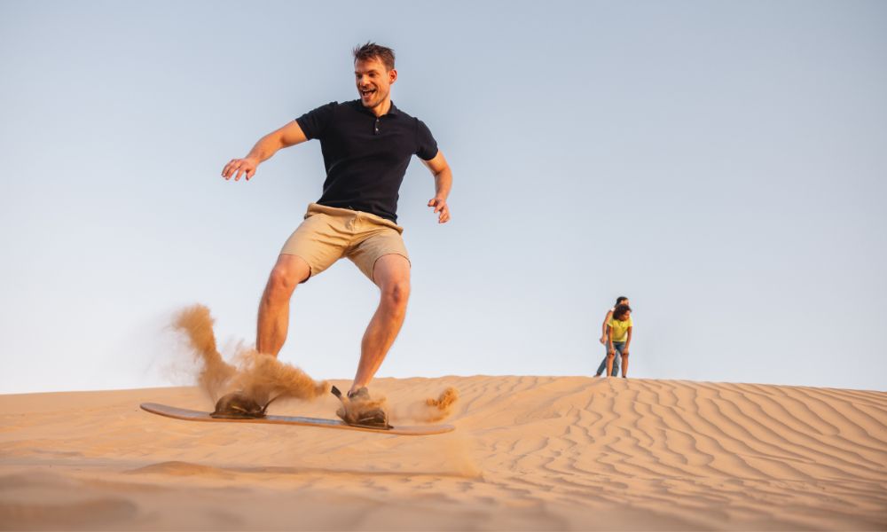 Sandboarding ride in the desert